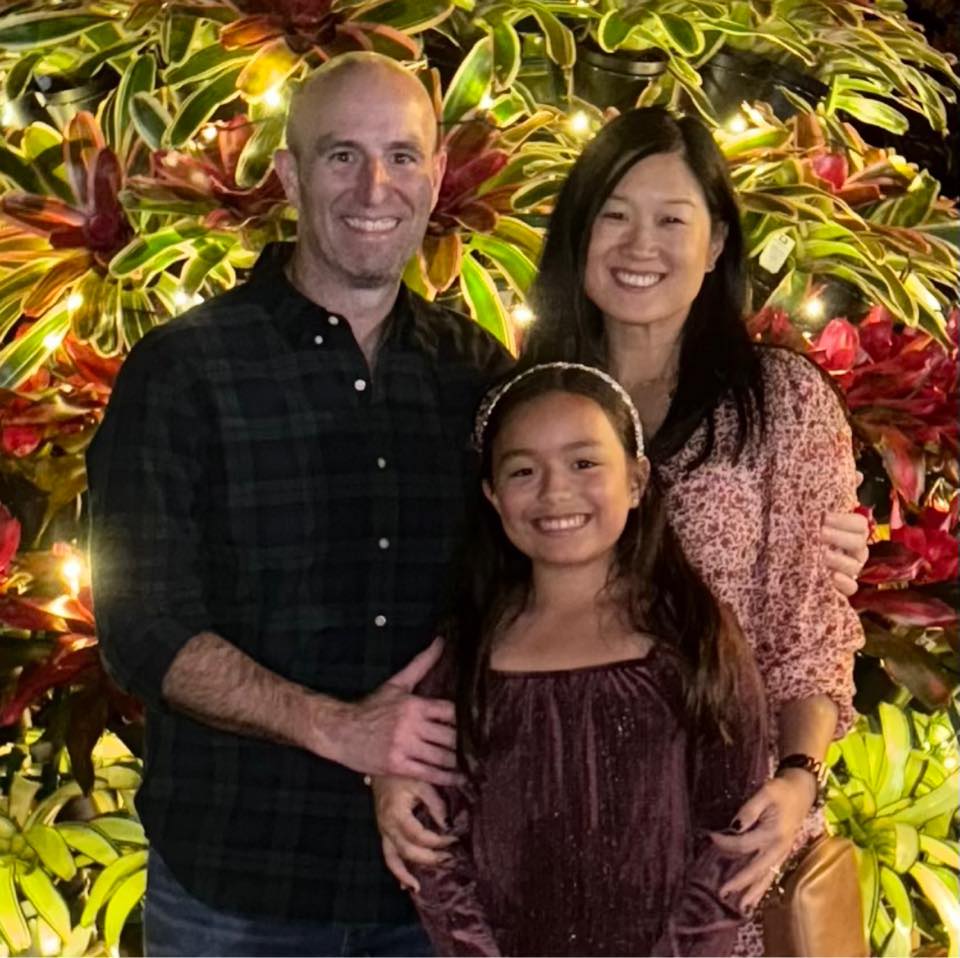 Small profile photo of a family of three, used as a customer review avatar beside a testimonial on the Off Leash K9 Training Springfield, MO site.